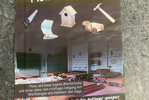 Plakat in der Holzwerkstatt