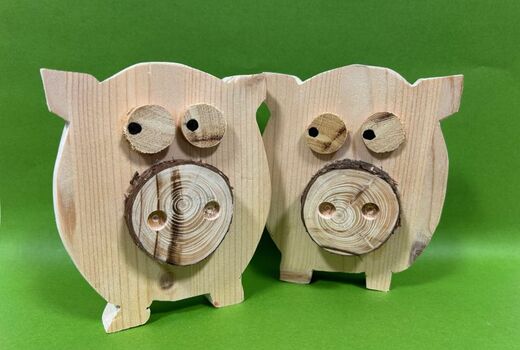 Zwei witzige Schweinchen aus Holz zum Aufstellen